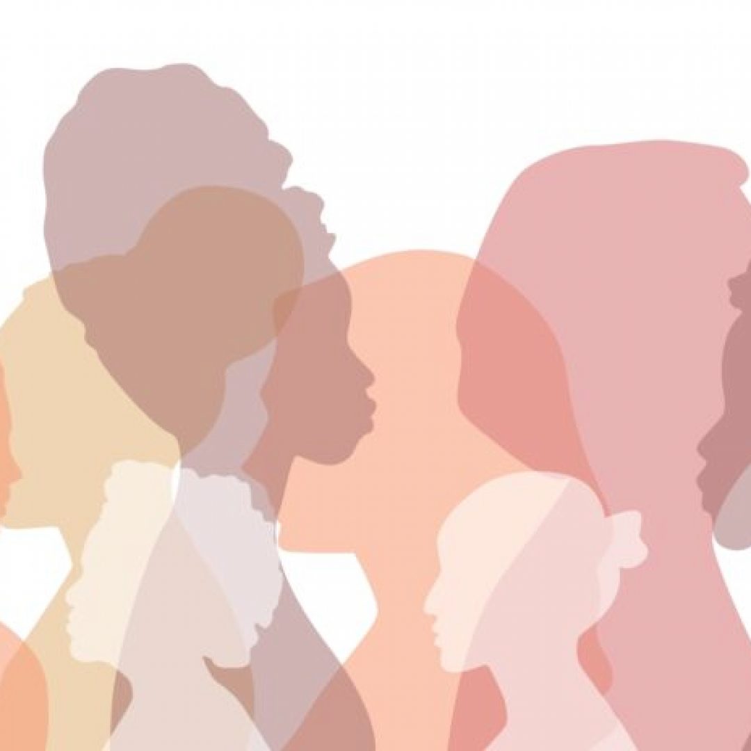 Women of different ethnicities stand side by side together.